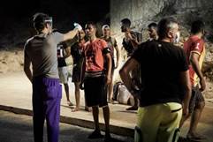 LAMPEDUSA, ITALY - AUGUST 30: Some migrants from Tunisia who arrived at night with an independent landing...