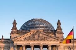 German flag fluttering front of Reichstag building. Berlin,