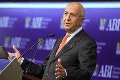 President of the Italian Banking Association (ABI) Antonio Patuelli (R) delivers a speech during the...