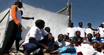 Risultato immagine per cooperativa accoglienza migranti